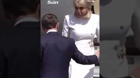 Moment Brigitte Macron ‘rejects’ husband’s help leaving plane after viral slap vid