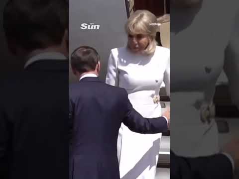 Moment Brigitte Macron ‘rejects’ husband’s help leaving plane after viral slap vid