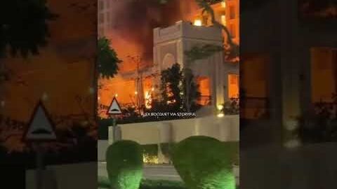 Fire at Dubai hotel after as Iran responds to US-Israeli attack