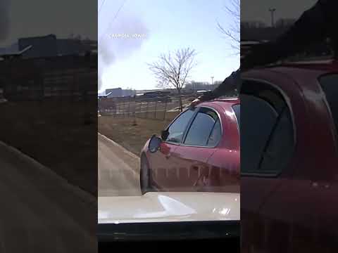 ‘Stop the car!’: Man attempts to evade police with officer clinging to windshield #Shorts
