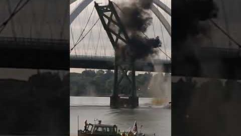 Controlled explosion sends pieces of a bridge tumbling into the water #Shorts