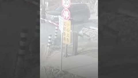 Car has near-miss close encounter with train in China | USA TODAY #Shorts