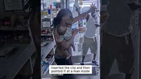 Dad Holding Baby Fights Off Gunman #shorts