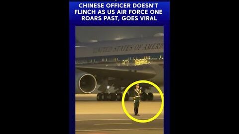 Video Of Chinese Officer Not Flinching As Trump’s Air Force One Lands Behind Him Goes Viral