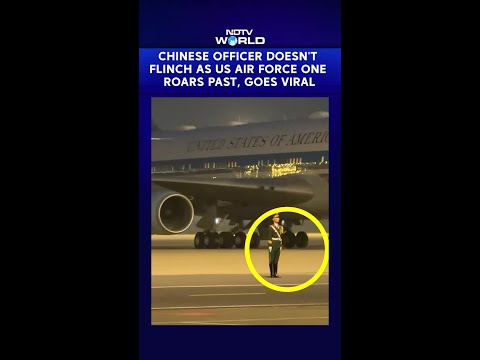 Video Of Chinese Officer Not Flinching As Trump’s Air Force One Lands Behind Him Goes Viral