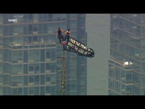 Masked couple climbs Empire State Building, has marriage proposal