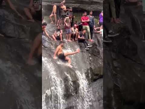 MAN SLIPPED FROM WATERFALL #shorts #youtubeshorts #viral #waterfall