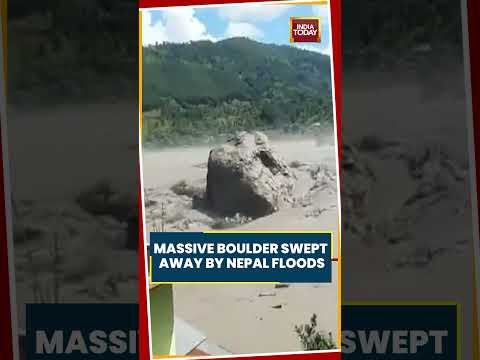 VIRAL VIDEO: Massive Boulder Swept Away By Powerful Nepal Floodwaters | Shocking Visuals #viral