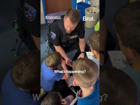 Police officer teaches kids not to be scared to call 911.